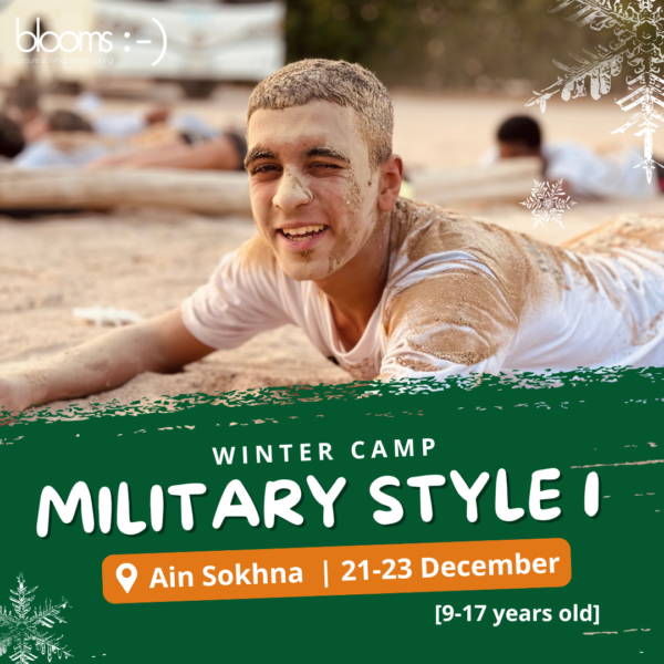 Military Overnight Camp portraying a boy having fun participating in physical activities in the mud.